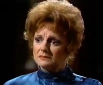 Carole Shelley as Iris